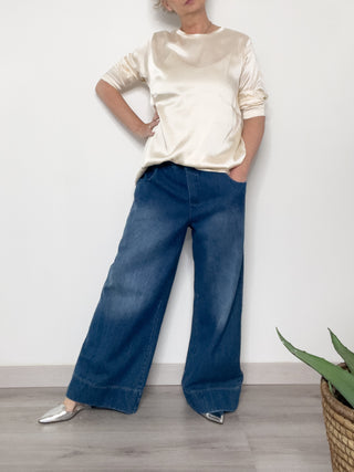 Jeans flare con lavaggio stone