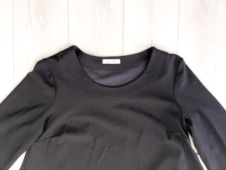 Maglia svasata con taschine