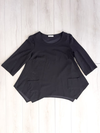 Maglia svasata con taschine