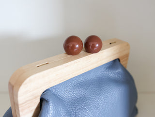 Clutch con maxi boules