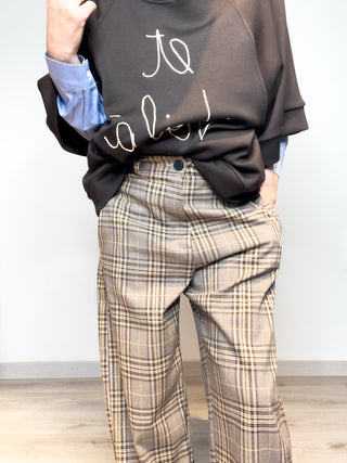 Pantalone in fantasia scozzese con riga gialla