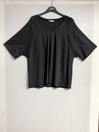 T-shirt over con manica raglan e scollo a V