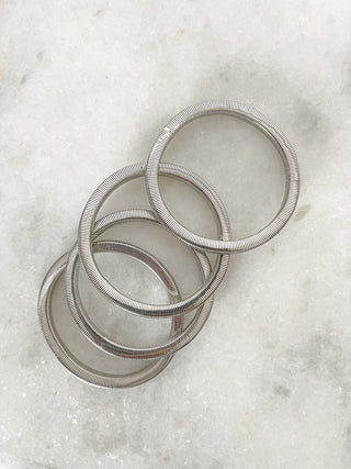 Set 4 bracciali elastici in finitura oro o argento