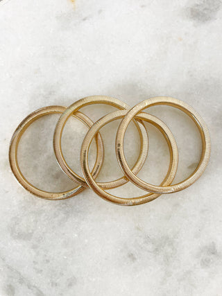 Set 4 bracciali elastici in finitura oro o argento