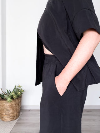 Pantalone wide leg in modal effetto seta lavata