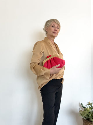 Clutch con maxi boules
