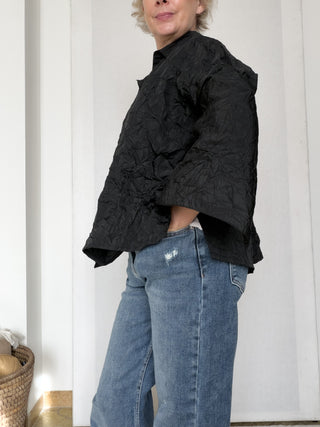 Camicia oversize stropicciata con maniche ampie