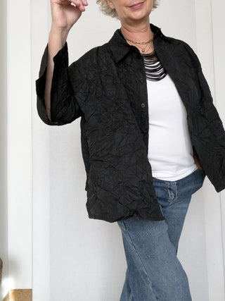 Camicia oversize stropicciata con maniche ampie