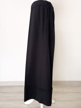 Pantalone a gamba larga con risvolto alto