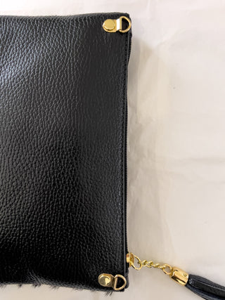 Pochette in cavallino e pelle