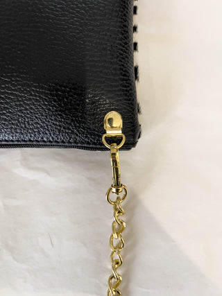 Pochette in cavallino e pelle